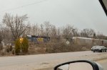 CSX SD40-2 and ES40DC leading a train